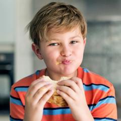 Kid Eating Sandwich